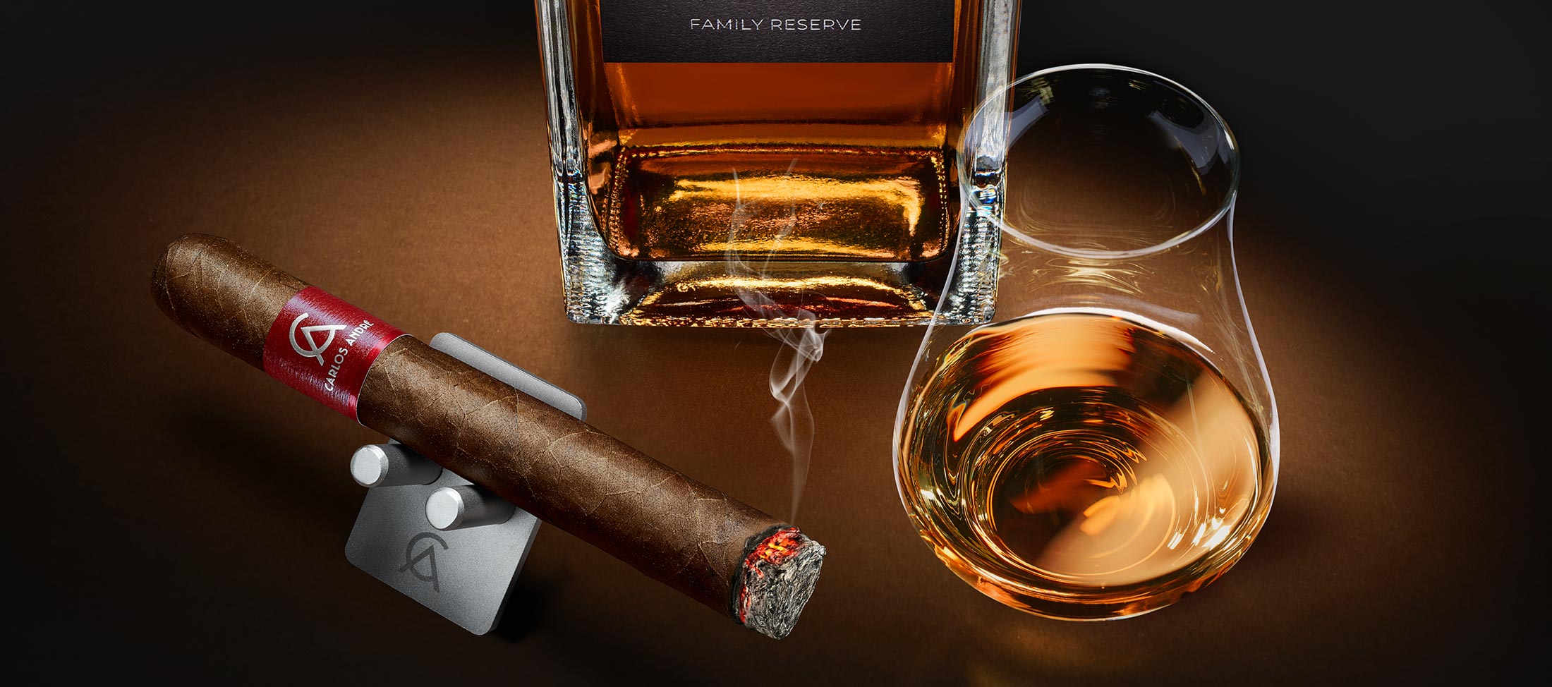 CARLOS ANDRÉ Rum and cigar